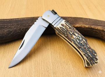 Custom's handmade deer antler folding knife with stainless steel blade